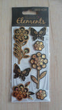 Papercraft scrapbook embellishments - Buttons - Ribbon - Gilded motif