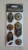 Papercraft scrapbook embellishments - Buttons - Ribbon - Gilded motif